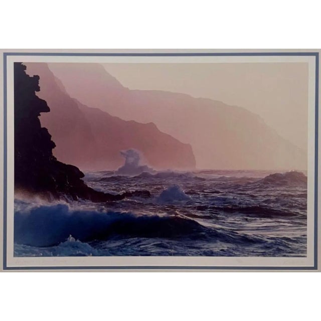 The Piece This striking, large-scale landscape photograph by Rick Canham captures an atmospheric Pacific coastline with an...