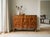 A fine 19th century Biedermeier commode from Austria made with beautifully patterned book matched veneer of walnut over...
