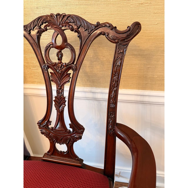 High-quality armchair that beautifully marries traditional craftsmanship with contemporary flair. Hand-carved solid...