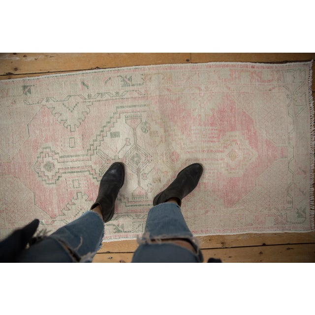 :: Center medallion with elongated finials bearing stepped contour atop a partially covered field of halved minor...