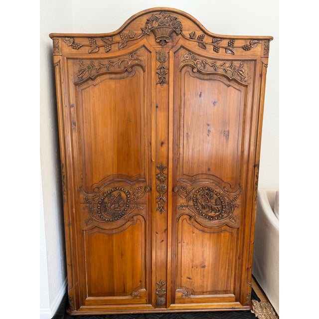 This beautiful antique hand carved wardrobe is an absolutely stunning piece. It sits on a beautiful base that is...