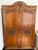 This beautiful antique hand carved wardrobe is an absolutely stunning piece. It sits on a beautiful base that is...