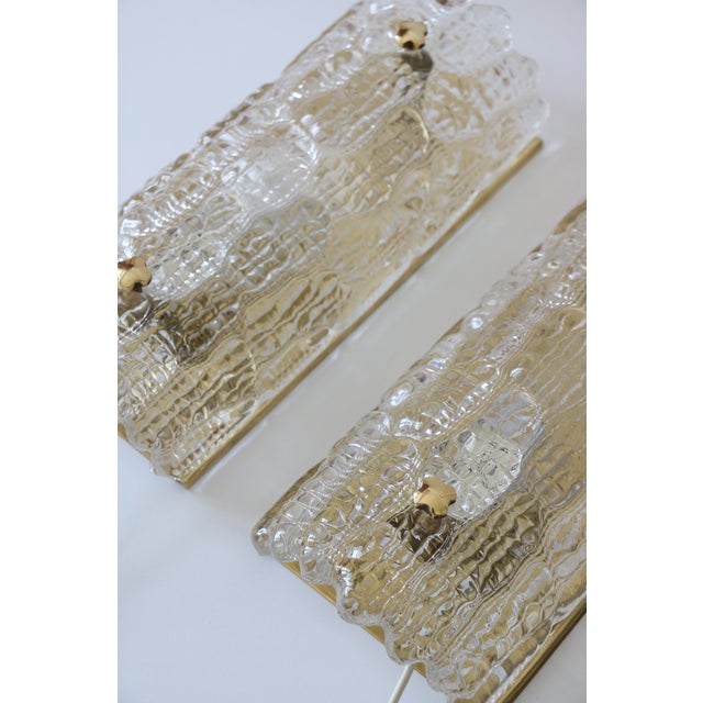 Pair of wall sconces in genuine brass and glass, 1960. designed by swedish designer carl fagerlund. produced in...