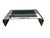This is a vintage waterfall stainless steel coffee table by pace. It is in very good condition. No mark or tag