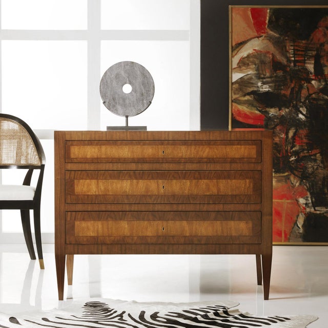 Honoring the craftsmanship and quality of the past, this gorgeous furniture piece is shure to become a modern-day...