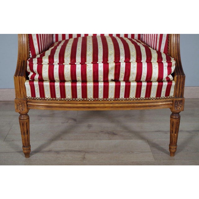 Early 20th Century French Louis XVI Style Walnut Bergères à Oreilles with Fluted Legs - A Pair For Sale - Image 9 of 12