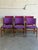 These organic dining chairs showcase curved floating seat pads and contoured backrests crafted from warm solid rosewood...