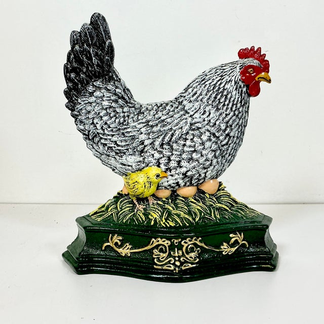 Vintage Home is pleased to offer this hand painted Cast Iron Hen, Chick & Eggs Doorstop. This piece is in very good...