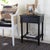 Traditional elegance is redefined in this Haines Accent Table. Refreshing timeless carved details with a sleek black...