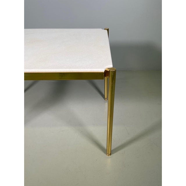 Low table by Osvaldo Borsani from the 20th century, in brass and rare Sivec marble, for Tecno. I have official proof of...