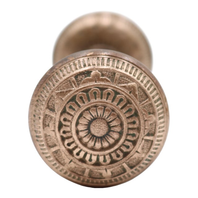 Pair of Antique Vernacular Polished Bronze Ornate Door Knobs For Sale