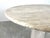 Timeless and beautiful travertine dining table very much in the style of Angelo Mangiarotti's tables. Beautiful conical...