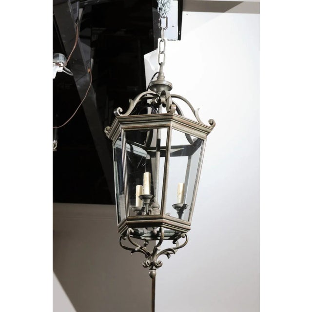 A Spanish hexagonal bronze lantern from the early 20th century, similar to the style of the Plaza de España built for the...