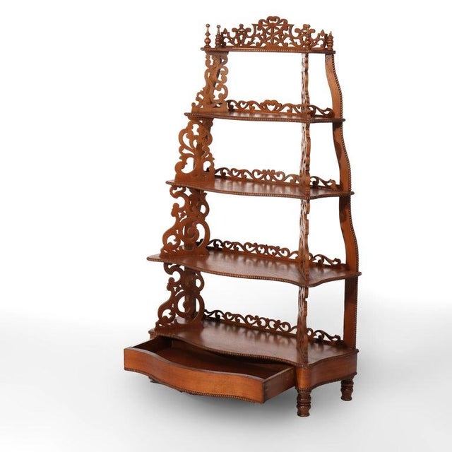 Antique Walnut Filigree 5 Shelf Etagere With Drawer C1880 Measures - 61 3/4" x 36" x 15 1/2" An antique walnut etagere...