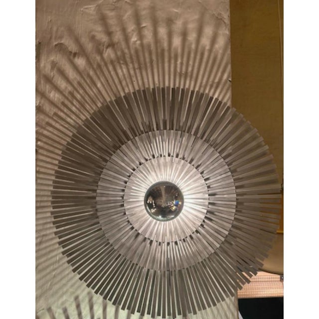 Lafayette aluminium wall lamp, large by radar. Dimensions: diameter 60 x d 20 cm. Materials: aluminium strips on a matte...