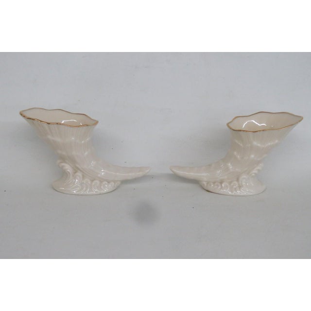 This charming pair of Cornucopia Figurines are made of porcelain. These lovely small figurines are stamped as being made...