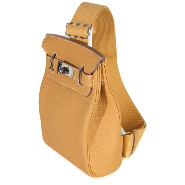 Item #: Z150920 Features Interior: One slip pocket Dimensions: 7 x 10.25 x 3 in Handbag Closure Type: Turnlock Strap...