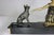 Beautiful Art Deco black and gold patinated bronze sculpture of a beautiful seated lady with two, German shepherds,...