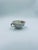 A collectible cup from Thuringia, crafted from high-quality porcelain. The cup features a low bowl set on a small base, a...
