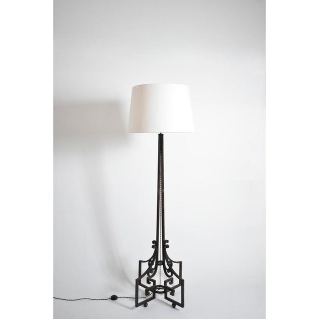Neoclassical wrought iron floor lamp, 1960s. Height: 156 cm - 61.42 in Length: 60 cm - 23.62 in Width: 60 cm - 23.62 in...