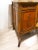 A magnificent 19th-century gilt Bronze mounted marquetry commode, signed Henry Dasson, 1883, showcasing the unparalleled...