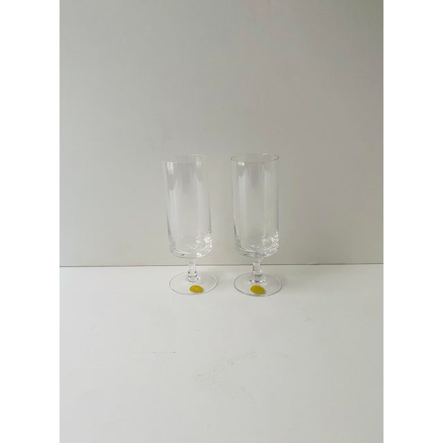 A beautiful pair of crystal Champagne flute glasses, Midcetury Modern design period, by Rosenthal Studio-Line, circa...