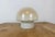 Vintage industrial ceiling or wall light made in former Czechoslivakia during the 1970s. It features a white porcelain...