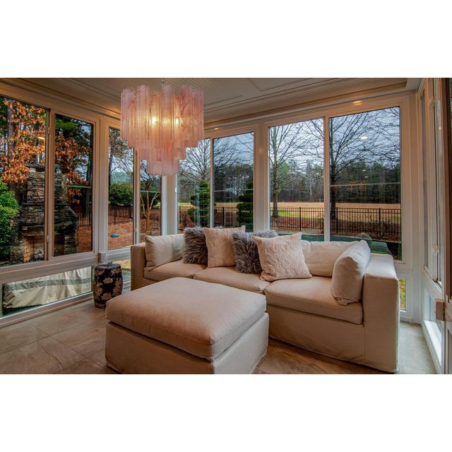 Trio Italian vintage glass chandeliers with alabaster pink glass tubes. The armor polished nickel supports 36 large glass...