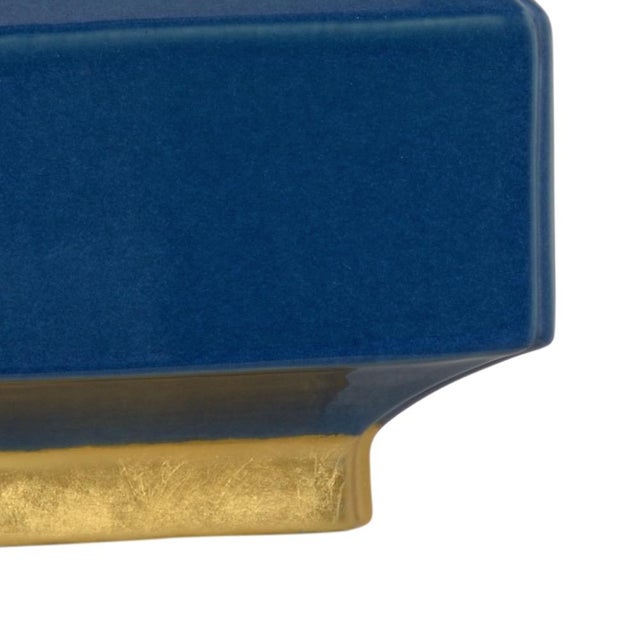 Cadet blue glaze on ceramic with antique gold leaf mounting 29h x 6w x 6d Shade Dimensions: top(13 x 13) bottom(15 x 15)...