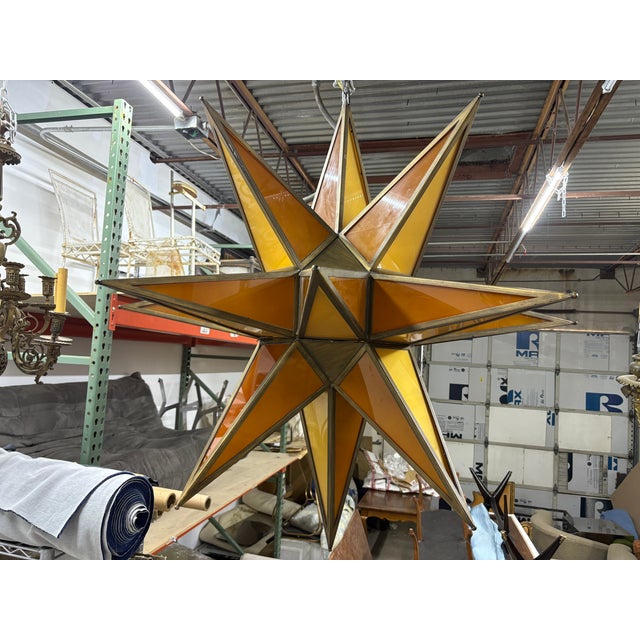 Monumental Star Shaped Chandelier. Offered is a most unusual Post-Modern star shaped 51 inch steel chandelier with inset...