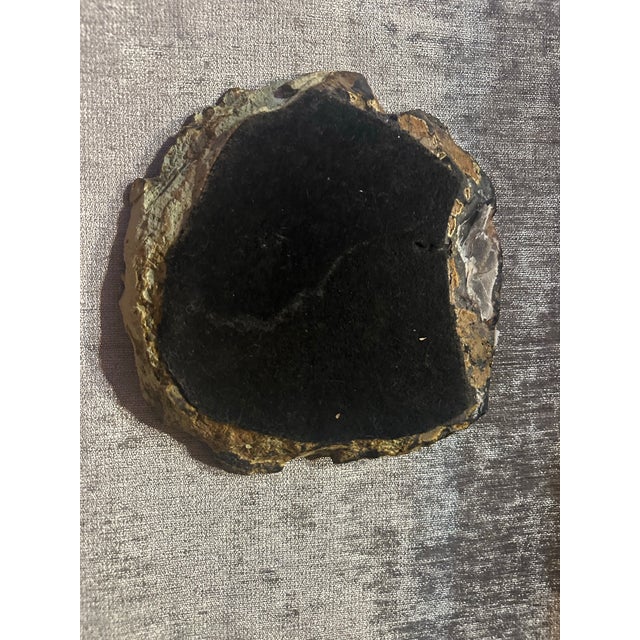Incredible little drilled oil lamp out of a geode. Beautiful Geode, drilled to hold oil as a soft light source. The bottom...