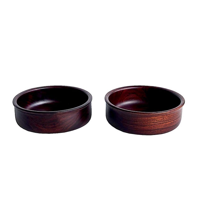 Offered is a pair of vintage hand turned Brazilian Rosewood catchall/trinket bowls. They have a subtle matte sheen, a...