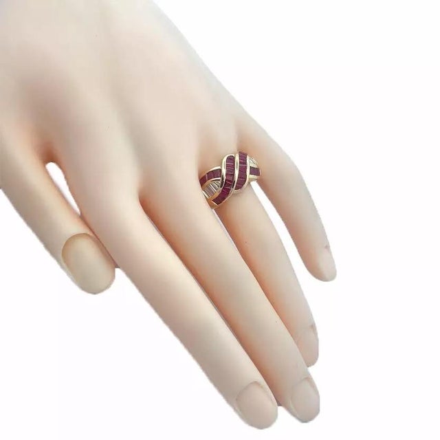 This lovely authentic ring is by designer Kurt Wayne, it is crafted from 18k yellow gold with a polished finish. The front...