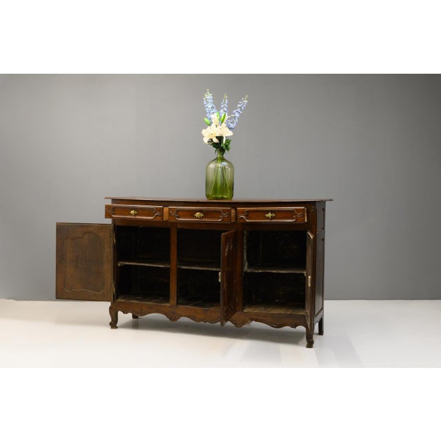 Large 3 door French oak buffet on cabriole legs. Circa 1880.