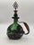 Antique 18th Century Green Glass Bocksbeutel Bottle with Dark Metal Mount and Ring-Shaped Stopper, in Very Good...