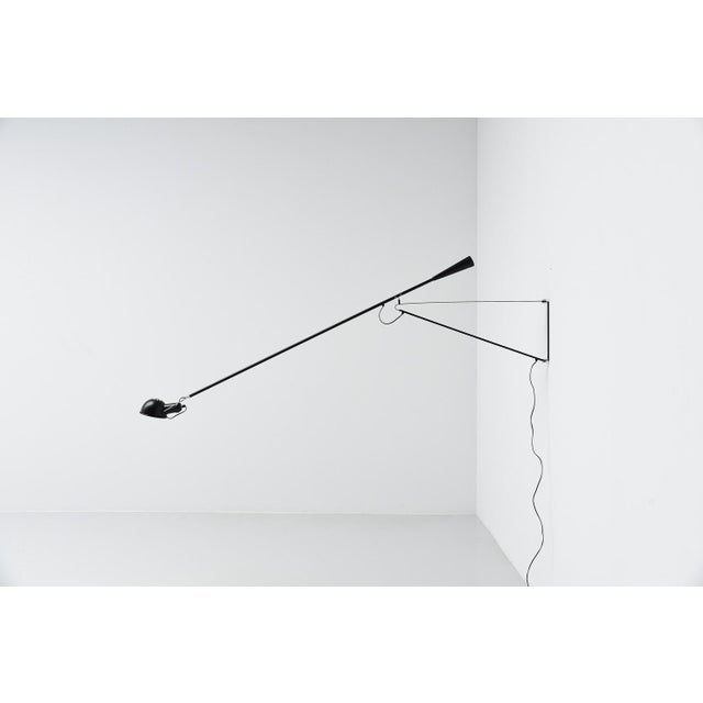 Impressive sized wall lamp model 265 designed by paolo rizzatto and manufactured by arteluce, italy 1973. This is for the...