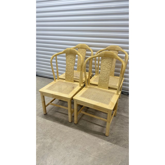 Set of four vintage Henredon dining chairs featuring classic Chinoiserie styling with carved back splats, gently curved...