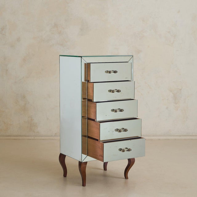 This French mirrored chest of drawers, dating to the early 1930s to late 1940s, embodies a distinctly Parisian...