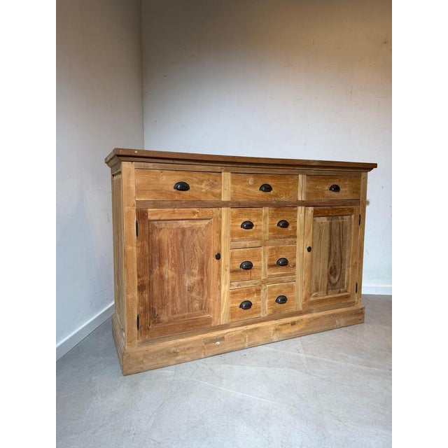 Bring warmth and character into your interior with this beautifully crafted rustic solid wood sideboard. Featuring natural...