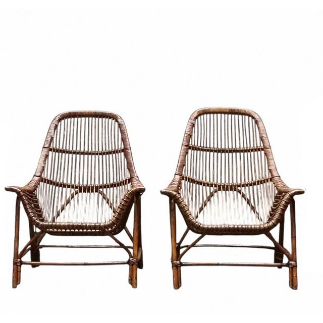 Iconic and collectible Italian design rattan set designed by George Coslin for Gervasoni, an Italian company renowned for...