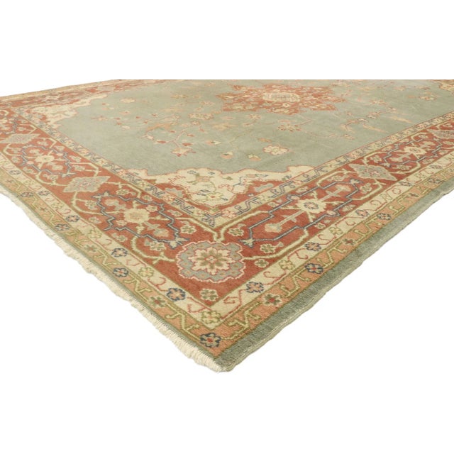 Distressed antique Turkish Oushak rug with rustic Georgian and Arts & Crafts style. A beautiful combination of warm...