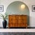 This elegant Biedermeier chest of drawers, dating to the early 19th century, features beautifully figured cherrywood...