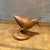 For your consideration, a vintage hand-carved wooden shorebird figurine, likely a snipe or wading bird, often designed in...