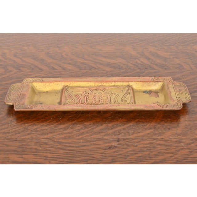A gorgeous Art Deco or Arts & Crafts period gilt bronze pen tray in the "Chinese" pattern By Tiffany Studios (signed to...