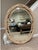 Vintage "Palm Frond" oval wall mirror from Carolina Mirror Company of North Carolina- one of the premier mirror makers of...