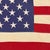 This vintage American flag is made from a cotton cloth with fully sewn stars and stripes. Please note staining,...