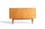 This versatile Danish teak sideboard combines elegant storage with functional details rarely found together in one piece....