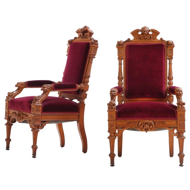 In the Gothic Revival or Renaissance Revival styles, this pair are sometimes referred to as "throne chairs" due to their...