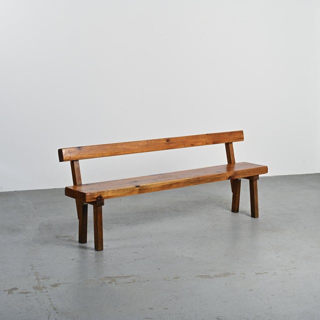 Solid pine bench by Christian Durupt, designed for the Courchevel resort in the 1960s. The bench consists of a thick...