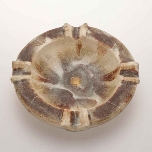 We are offering a round, handmade vintage ceramic ashtray by Ruscha Art from Germany, in a very good condition. It is...